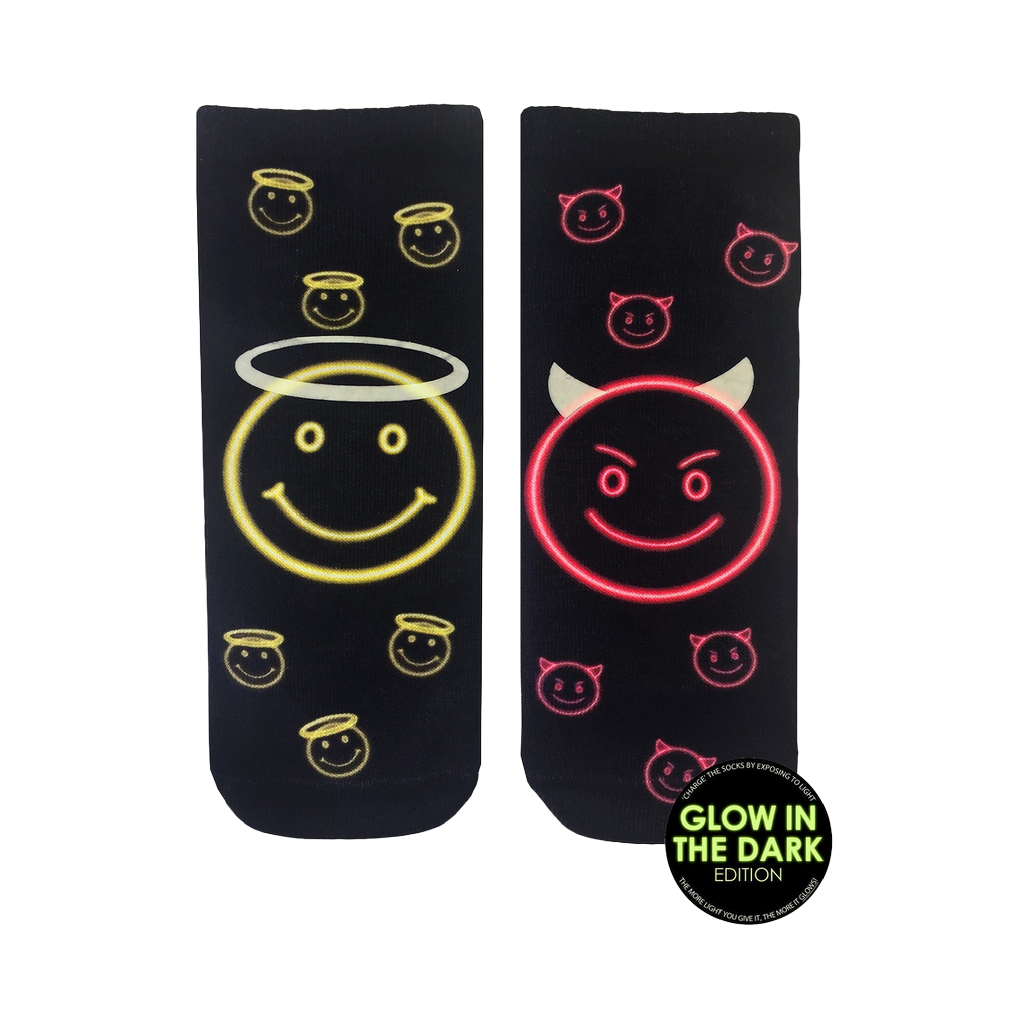 Pair of black crew socks with a glow-in-the-dark design. One sock features a neon yellow angel smiley face, the other a neon pink devil smiley face.