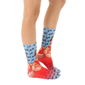 Side view of Schwarzenegger socks on a person's legs, showcasing the design and fit. [lf]