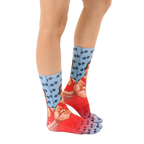 Side view of Schwarzenegger socks on a person's legs, showcasing the design and fit. [lf]