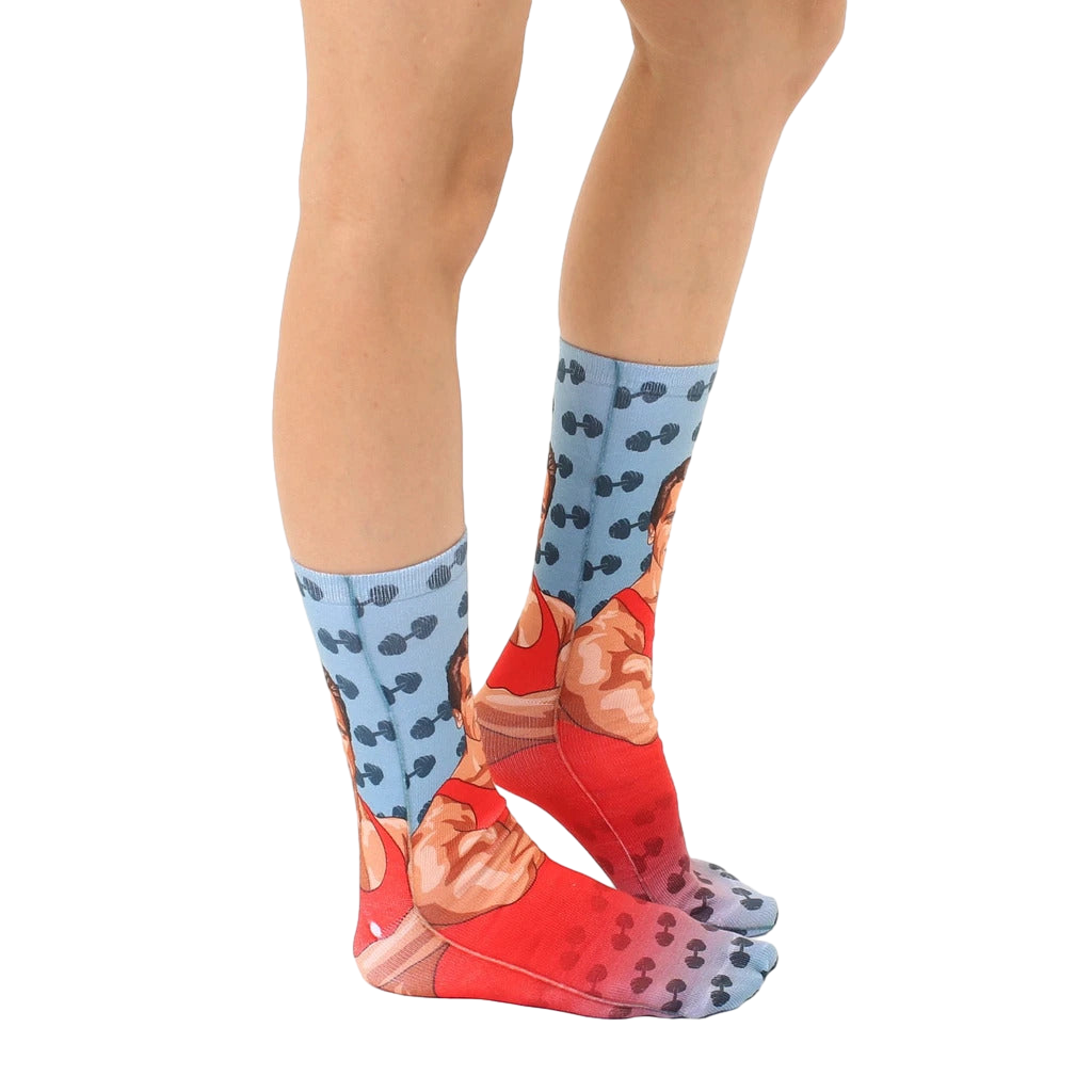 Side view of Schwarzenegger socks on a person's legs, showcasing the design and fit. [lf]