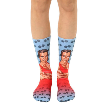 crew length socks in blue and red feature a dumbbell pattern and a photo of arnold schwarzenegger flexing his muscles.  