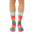 A pair of crew socks showcasing a whimsical design of rainbow-colored pancakes with syrup.  Mint green cuff. [lf]