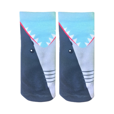 A pair of crew socks with a shark's-eye-view design. Mostly dark gray and light blue with white and red teeth details.