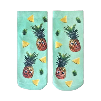 Pair of mint green ankle socks with a fun pattern of googly-eyed pineapples and pineapple slices.