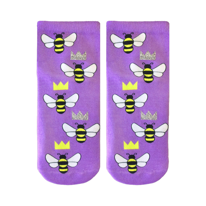 Pair of lavender ankle socks adorned with a repeating pattern of cartoon bees and glitter crowns.  }}