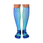 Pair of women's knee-high socks with a mermaid tail scale pattern in shades of blue and green.