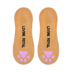 Close-up view of the soles of the Kitty socks, displaying 'Living Royal' text and pink paw prints.