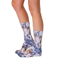 Lifestyle shot of a person's legs wearing the Puppy All Over crew socks. The socks are shown from the side, showcasing the all-over puppy print. [lf]