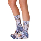 Lifestyle shot of a person's legs wearing the Puppy All Over crew socks. The socks are shown from the side, showcasing the all-over puppy print. [lf]