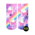 Crew socks showcasing pink llamas with wings against a purple galaxy background featuring a rainbow.  Glow-in-the-dark details.