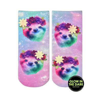 Crew socks with a pastel galaxy print.  Rainbow sloths wear flower crowns.  Glow-in-the-dark feature.