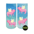 Lifestyle shot of the 'When Pigs Fly Glow' socks on a person's feet. The glow-in-the-dark detail is subtly visible.