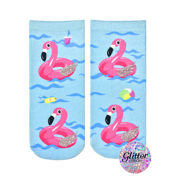 light blue ankle socks featuring flamingos, pool floats, and fruity drinks.   