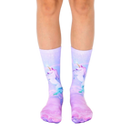 Crew socks in pastel purple, featuring a whimsical design of unicorns in a starry sky. Perfect for adding a touch of magic to your everyday look. [lf]