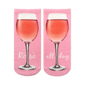 Pair of pink ankle socks with a graphic of a glass of rosé wine and the text 'Rosé all day'.