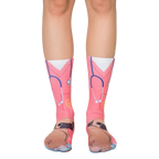 Pair of crew socks featuring a pink veterinary scrub design with a cute pug face at the bottom. Stethoscope and paw print details included. [lf]