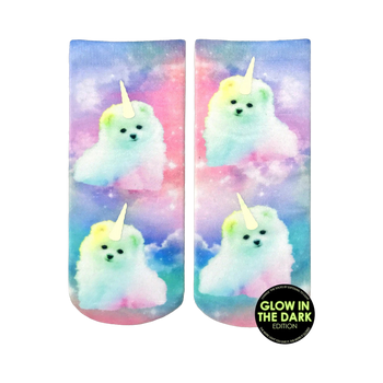 Crew socks featuring pastel rainbow-colored unicorn puppies on a galaxy print.  They glow in the dark!