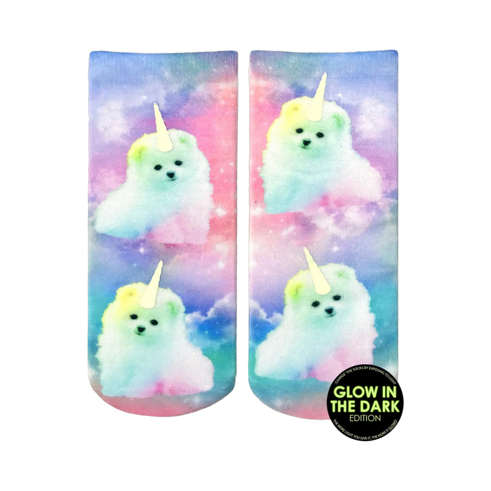 Crew socks featuring pastel rainbow-colored unicorn puppies on a galaxy print.  They glow in the dark! }}