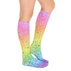 Lifestyle photo showing a person's legs wearing the rainbow doodle knee-high socks. [lf]