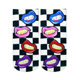black and white checkerboard socks with bright pink, blue, red, and purple grillz mouths   