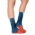 Lifestyle shot of a person wearing the Lawyer socks, showcasing the fit and style on the legs. [lf]