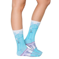 Lifestyle shot: A model's legs in the Dentist socks, showcasing how they look when worn. [lf]