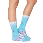 Lifestyle shot: A model's legs in the Dentist socks, showcasing how they look when worn. [lf]