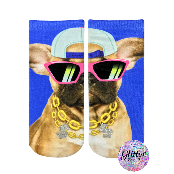 Crew socks featuring a French bulldog wearing pink sunglasses, a baseball cap, and a gold chain. The background is bright blue. Glitter edition. [lf]