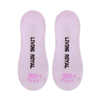 Close-up of the inside of the hedgehog socks, showing the 'Living Royal' branding and pink paw prints.