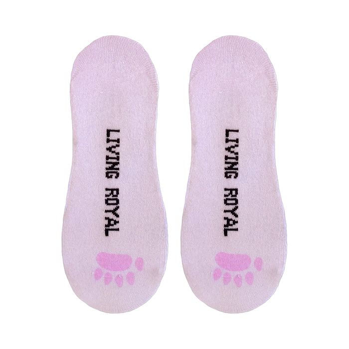 Close-up of the inside of the hedgehog socks, showing the 'Living Royal' branding and pink paw prints.