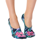 Lifestyle shot of a woman's feet wearing the 'Girls Rule' no-show socks. [lf]