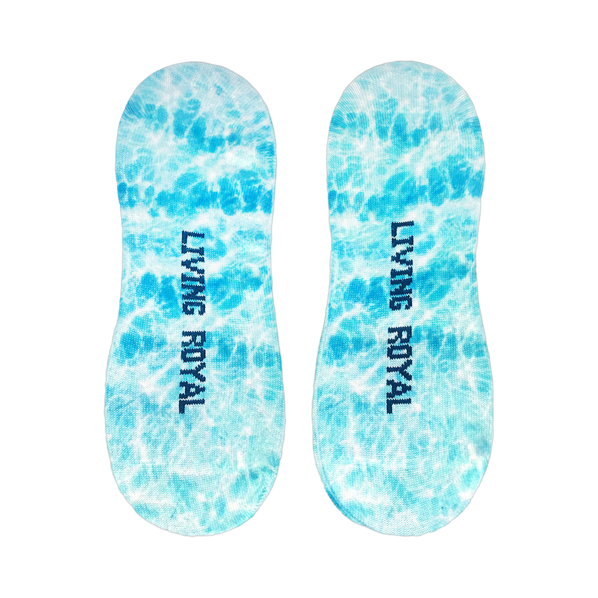 Flat lay image showcasing a pair of light blue no-show socks with a tie-dye effect and the words 'LIVING ROYAL' on them.
