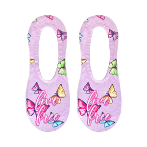 Flat lay showcasing a pair of lavender 'Live Free' no-show socks with butterfly print.