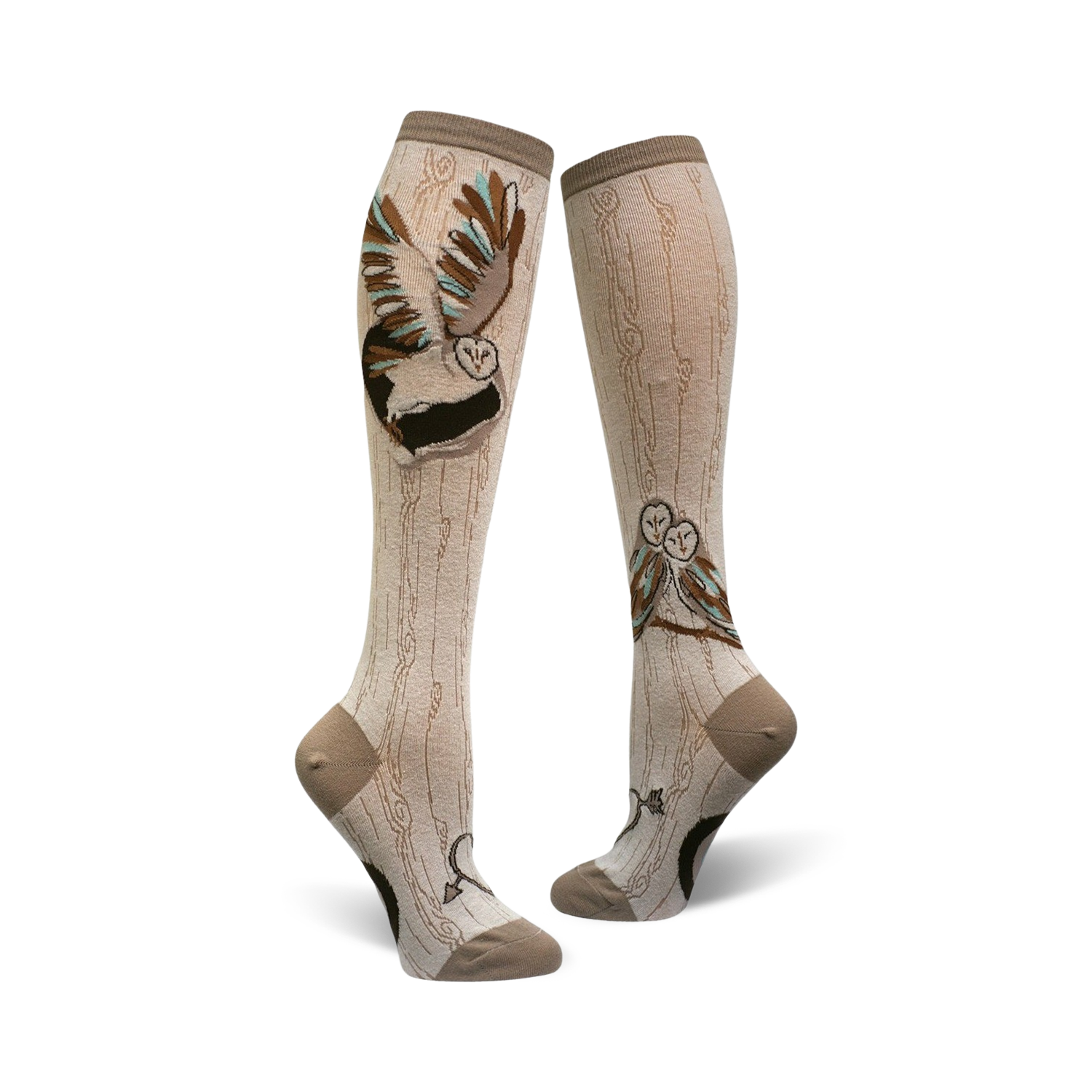 A pair of beige knee-high socks with a whimsical barn owl design. One sock shows a single owl in flight; the other shows two owls perched on a branch.
