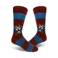 Pair of crew socks in red and blue horizontal stripes. A whimsical goat eating is featured on each sock.