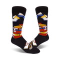 A pair of black crew socks with a colorful stack of books and glasses design. Perfect for book lovers!