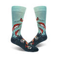 A pair of teal and dark grey crew socks with a design of red sockeye salmon leaping from the water. 