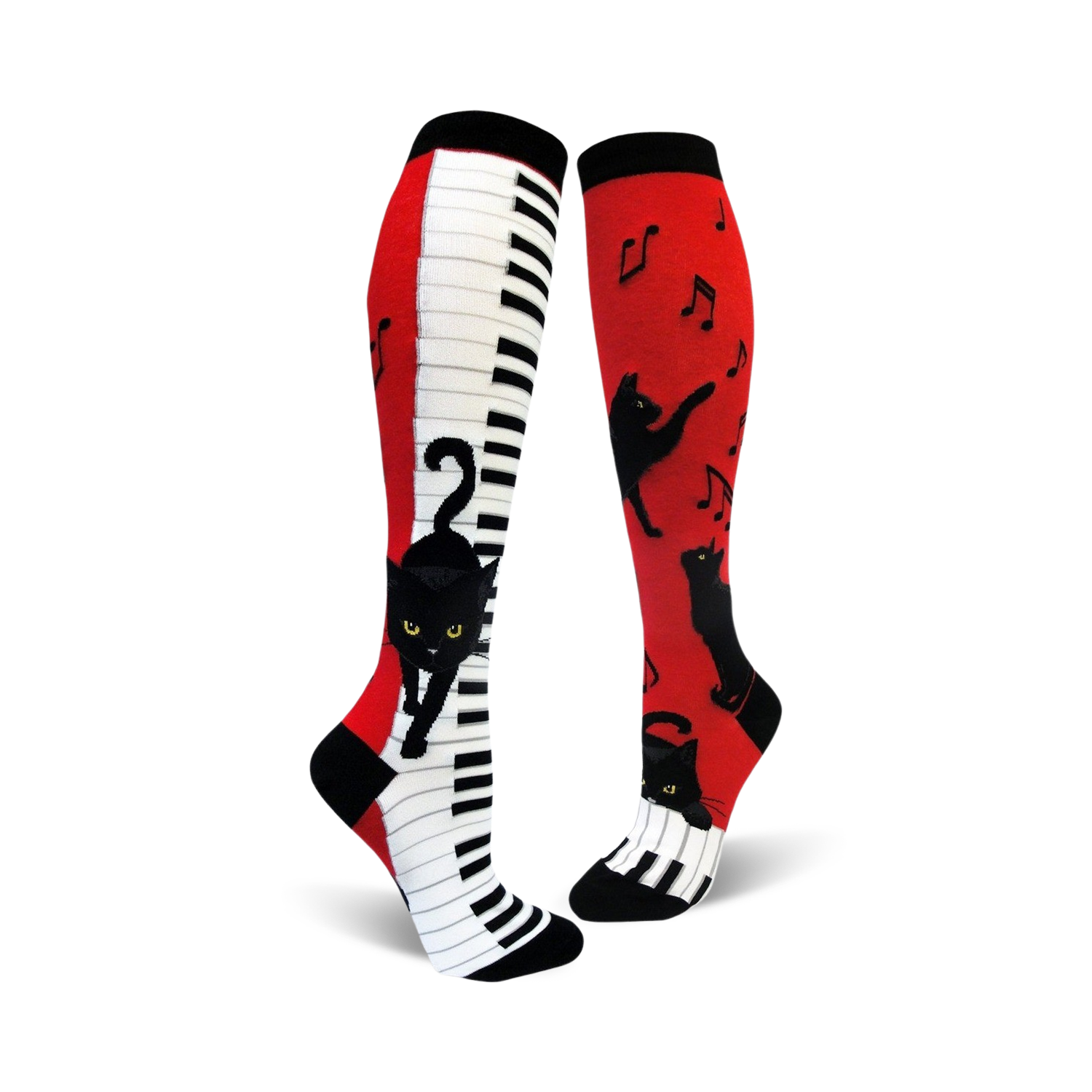A pair of red and white knee-high socks with a piano keyboard and playful black cats.  Musical notes are also featured.