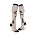 Pair of grey knee-high socks with a whimsical design of a unicorn riding a unicycle.  Black cuff and subtle star details.
