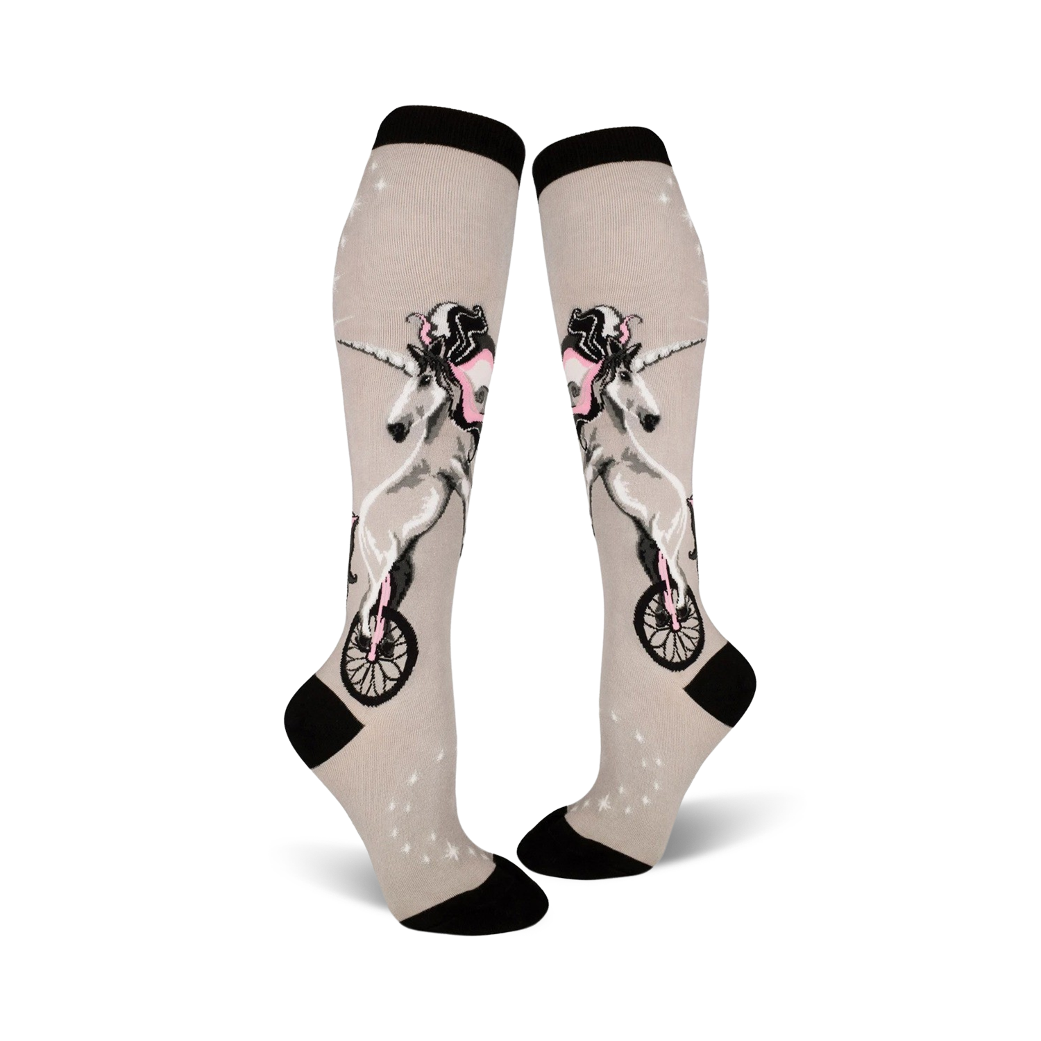 Pair of grey knee-high socks with a whimsical design of a unicorn riding a unicycle.  Black cuff and subtle star details.