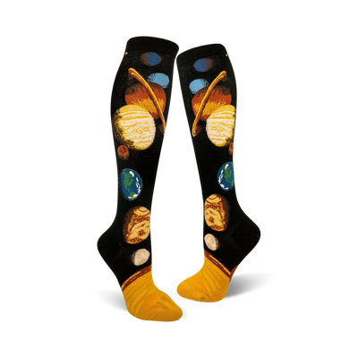 black knee-high socks feature a cartoon-like solar system pattern for women who love space.  