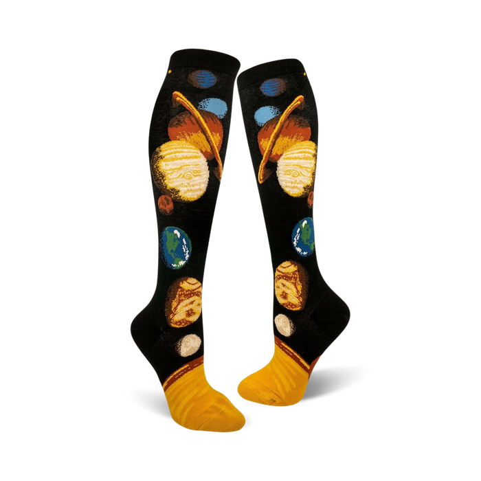 black knee-high socks feature a cartoon-like solar system pattern for women who love space.   }}