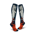Pair of navy blue knee-high socks.  A gray whale and an orange octopus are depicted on the socks.