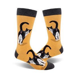 black and white tuxedo cat butt pattern on yellow crew socks for men. gray toe, heel, and cuff.   