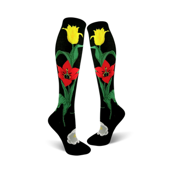black knee-high womens socks feature a red and yellow tulip pattern along with green stems and leaves.  