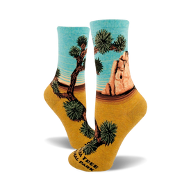 joshua tree socks with images of joshua trees and brown rocks. crew length with cotton material for women.  