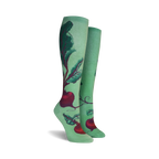 Lifestyle shot of a woman's legs wearing the beet socks outdoors.