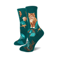 Crew socks in teal featuring a ginger cat with a mermaid tail, seahorses, starfish, seashells, and jellyfish.