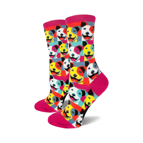 Crew socks featuring a Pop Art design of smiling pitbulls in bright colors like pink, yellow, and blue on a white background.