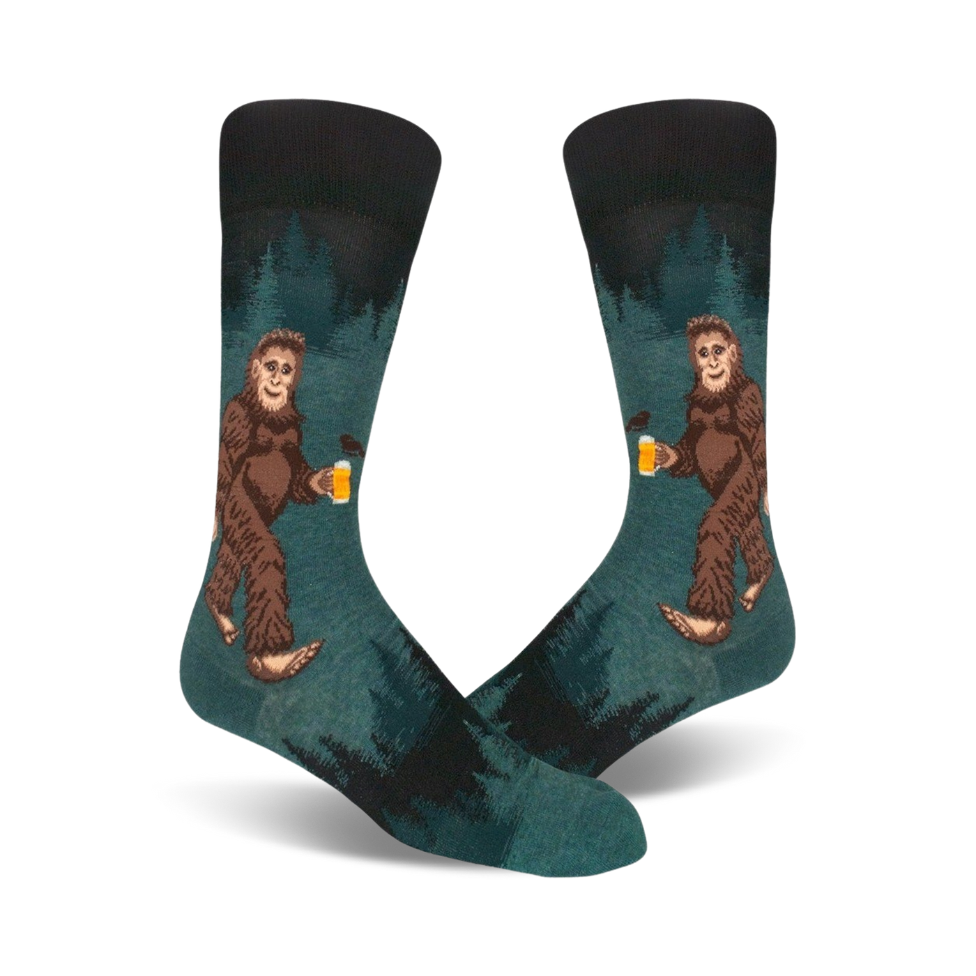 Pair of teal crew socks depicting a Bigfoot character enjoying a beer in a forest setting. Darker teal and black accents.